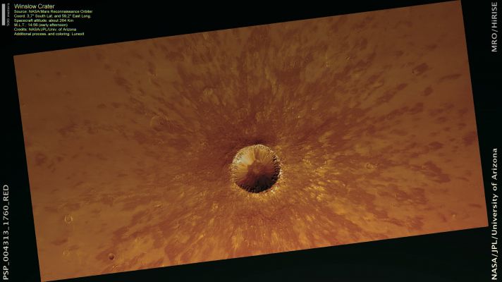 Winslow Crater - context frame n. 1 (MULTISPECTRUM; credits: Lunexit)
In this first HiRISE image of Winslow Crater (PSP_004313_1760), distinct dark rays surrounding the crater and are consistent with the THEMIS data’s suggestion of rockier materials. V-shaped patterns in the rays — referred to as a “herringbone” pattern — are identical to those around fresh Lunar Craters. 
These form when materials are ejected from the crater at a very low angle, which form clusters of secondary craters that preferentially eject materials down-range in a V-shaped pattern. (It‘s the same pattern that you would get when shooting a water pistol nearly parallel to a sidewalk.)

Also noteworthy are the large meter-to-decimeter-sized boulders on the steep rim that have not been buried or physically weathered to smaller sizes in this windy region, indicating that they have not been exposed long. 
This is also reminiscent of Meteor Crater and examples of fresh simple craters on the Moon.

The ring of rocky, cliff-forming materials in the inner wall of the Crater represents original bedrock that was uplifted and exposed by the impact. The characteristic morphology is called “spur and gully” consisting of both the protruding bedrock inter-fingered with debris shoots feeding fans of sandy materials that extend down to the crater floor. 
Throughout this Region, the present-day surface consists of a mix of global dust and volcanic sands from the Syrtis Major complex that typically cover the local bedrock. Winslow Crater is an excellent example of how craters can provide a window into the subsurface by exposing the local bedrock within the ejecta and crater wall.
Parole chiave: Mars from orbit - Craters - Winslow Crater