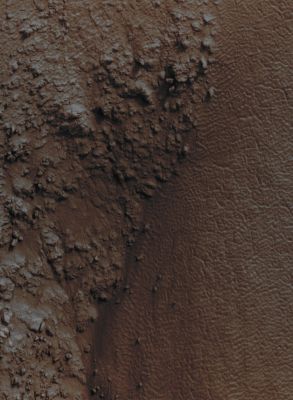Gullies in Mantle Terrain in Sisyphi Planum (EDM - Absolute Natural Colors; credits for the additional process. and color.: Dr Paolo C. Fienga - Lunexit Team) 
Caption NASA:"This EDM shows the Boundary between one of the Alcoves and the surrounding Mantled Terrain. Numerous Fissures arranged forming Polygons some 3 to 10 meters (3,3 to 11 yards) across are visible in the image. These are similar to features found in Terrestrial Periglacial Regions such as Antarctica, where ice is present at or near the Surface. Antarctica's Polygons form by repeated expansion and contraction of the soil-ice mixture due to seasonal temperature oscillations; this results in Polygonal Networks of Stress Fractures".
Parole chiave: Mars from orbit - Craters - Unnamed Crater with Gullies - Sisyphi Planum Region