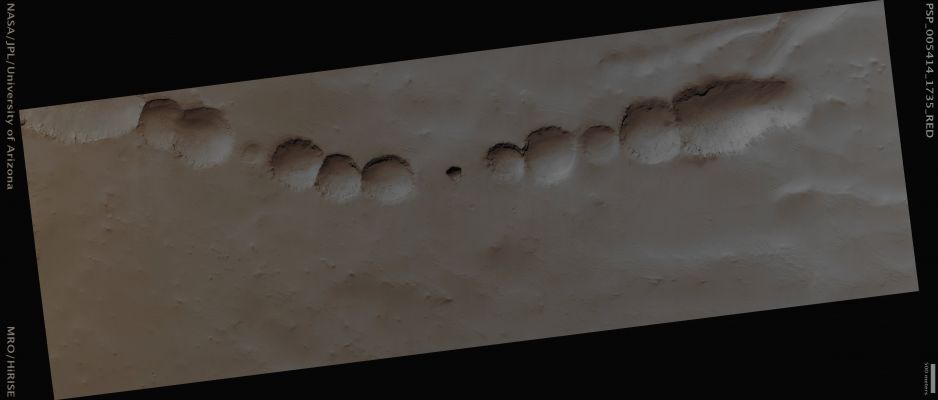 Pit Chain on Arsia Mons (CTX Frame - Absolute Natural Colors; credits for the additional process. and color.: Dr Paolo C. Fienga - Lunexit Team)
Caption NASA:"The Chain of Collapse Pits visible in this image formed by collapse as the giant Shield Volcano, Arsia Mons, was pulled apart. While Magma intruding into the Volcano might have pushed the rocks aside, it is also possible that the collapse is caused by the volcano falling apart underneath its own weight. 

Acquisition date: September, 22nd, 2007 
M.L.T.: 14:14 (Early Afternoon)
Latitude (centered): 6,5° South 
Longitude (East): 240,0°
Spacecraft Altitude: 252,4 Km 
Original Image Scale Range: 25,3 cm/pixel (with 1 x 1 binning) so objects ~76 cm across are resolved 
Map Projected Scale: 25 cm/pixel and North is up 
Map Projection: EQUIRECTANGULAR 
Emission Angle: 3,9°
Sun-Mars-Spacecraft (Phase) Angle: 38,1°
S.I.A.: 34°, with the Sun about 56° above the Local Horizon 
Solar Longitude: 318,2° (Northern Winter)
Parole chiave: Mars from orbit - Volcanic Features - Pit-Chain