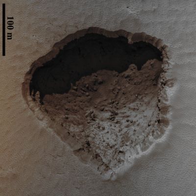 Pit Chain on Arsia Mons - "Annie" (EDM - Absolute Natural Colors; credits for the additional process. and color.: Dr Paolo C. Fienga - Lunexit Team)
Caption NASA:"This small Pit located in the middle of the Chain was discovered by a team of scientists from the U.S. Geological Survey and Arizona State University using data from the THEMIS camera onboard the Mars Odyssey Spacecraft during a search for possible Cave Entrances. They informally named this pit "Annie".
A section of the HiRISE image over "Annie" has been specially processed to enhance the contrast in the shadowed areas. This shows that the Pit is is largely filled with wind blown materials. Shadow measurements indicate that the Floor is about 112 meters (367 feet) below the Rim".
Parole chiave: Mars from orbit - Volcanic Features - Pit-Chain