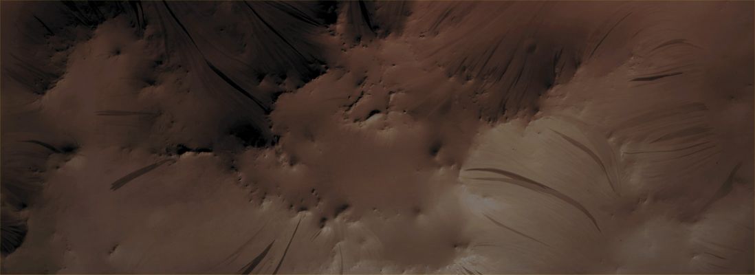 Slope Streaks (Absolute Natural Colors; credits for the additonal process. and color.: Dr Paolo C. Fienga - Lunar Explorer Italia)
Mars Local Time: 14:05 (early afternoon)
Coord. (centered): 12,2° North Lat. and 26,4° East Long.
Spacecraft altitude: 288,4 Km (such as about 180,3 miles) 
Original image scale range: 28,9 cm/pixel (with 1 x 1 binning) so objects ~ 87 cm across are resolved
Map projected scale: 25 cm/pixel
Map projection: EQUIRECTANGULAR
Emission Angle: 18,3° 
Phase Angle: 57,3°
Solar Incidence Angle: 41° (meaning that the Sun is about 49° above the Local Horizon)
Solar Longitude: 322,6° (Northern Winter)
Credits: NASA/JPL/University of Arizona
Additional process. and coloring: Lunar Explorer Italia
Parole chiave: Mars from orbit - Slope Streaks over a small Knob