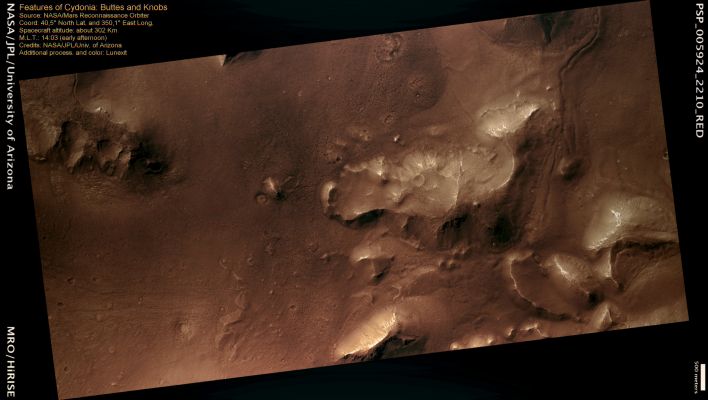 Features of Cydonia (MULTISPECTRUM; credits: Lunexit)
The Cydonia Region on Mars is located in Arabia Terra at the boundary between the Northern Lowlands and Southern Highlands. This Region gained notoriety when Viking imaged a landform that looked like a face.

The “Face” has subsequently been imaged by many orbiters, including HiRISE ( PSP_003234_2210), showing that it is simply a rocky mound, and the face-like appearance was due to a trick of shadows. This observation was taken of a Region slightly to the South-West of that landform.

This Region is characterized by Knobs and Buttes. Knobs are rounded hills and Buttes are hills with steep vertical sides and a flat top. A butte is similar to a plateau, but smaller in scale. These are features that are resistant to erosion, and there are several ways that such features may become more resistant than the surrounding areas. They can be plutonic intrusions or volcanic rocks that are more resistant rock types than the surrounding sedimentary rock. Alternatively, these Regions may be resistant because they have been cemented by water carrying dissolved ions that precipitate as minerals binding the sediment together. 
Either way, they provide important information about the geologic history of the Region.

Of note in this image is the interesting pitted and patterned ground. This pitting may have resulted from the sublimation of interstitial ice. Patterned ground is common throughout the Northern Mid-Latitude Plains.
Parole chiave: Mars from orbit - Buttes and Knobs - Cydonia Mensae Region