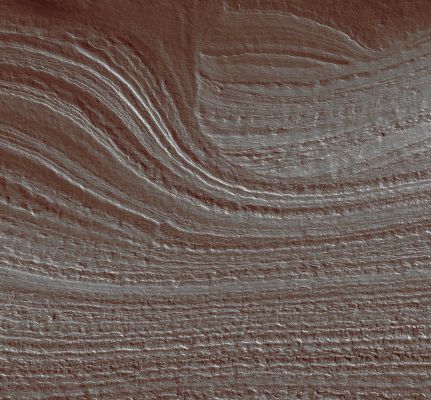 Unconformity in the South Polar Layered Deposits (SPLD) - (extra-detail mgmf - natural colors; elab. Lunexit)
The layers in the upper center/right end abruptly (truncate) at a curve in the layers that extend along the left side of the image. 
This type of truncation (termed "unconformity" in Geology) is usually due to erosion, wherein the layers in the lower right were eroded, followed by later deposition of the rest of the layers on top of the older layers (layer age likely increases from left to right). It is also possible that flow of these icy layers played a part in the complicated layer geometry exhibited in this extra-detail mgnf".
Parole chiave: Mars from orbit - South Polar Layered Deposits