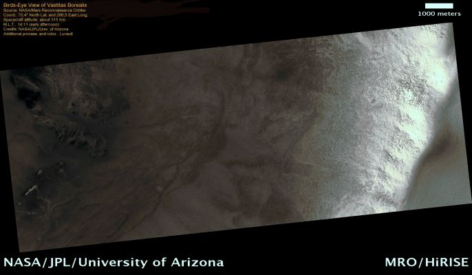 Dunes in Vastitas Borealis (MULTISPECTRUM; credits: Lunexit)
Windblown sand can be used to tell us the wind direction on Mars. Small-scale features, such as Ripples and Wind Tails, indicate the most recent wind directions.
Wind-Tails may be the remnants of a formerly widespread mantle of sediment that has been removed. Alternatively, they may have formed when aeolian sediment is deposited in the wind-shadow zone behind obstacles such as the 1,5 mt diameter boulders on the crater rim (Sx of the image). Their orientation points in the downwind direction and in this frane you can see two wind tails that extend from some boulders, thus indicating winds blowing from at least two different directions.
Ripples occur on the surface of all dunes imaged at HiRISE resolution on Mars and the alignment of Ripples often results from the influence of more than one wind direction.

In this frame, the Ripples are superimposed on a low dome dune. 

On Earth, ripples on the surface of sand dunes may re-orientate in a matter of hours, but the time required to re-orientate Ripples on Mars is unknown.
Parole chiave: Mars from orbit - Vastitas Borealis Region