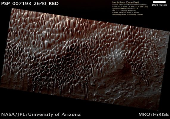 Defrosting Northern Dunes (context frame - MULTISPECTRUM; credits: Lunexit)
In Northern Winter a Seasonal Polar Cap composed of Carbon Dioxide (CO2) ice (dry ice) forms in the North Polar Region. This Cap covers a vast sea of dunes at high Northern Latitudes. In the spring the ice sublimates (evaporates directly from ice to gas) and this active process loosens and moves tiny dust particles.
Parole chiave: Mars from orbit - Dunes