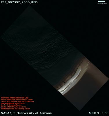 Northern Hemisphere Ice Cap (False Colors; credits: Lunexit)
This image shows layering within the Northern Hemisphere Ice Cap, which probably reflects seasonal variability in accumulation of the ice versus sublimation (going from solid to a gas).
The presence of sand dunes indicates transport of sedimentary materials by wind. Erosion of layering is apparent as a series of undulating ridges at the transition between the Layered Terrain and the Dune-Field. 

Near the top of the image several vents occur where materials from the shallow subsurface are erupted onto the surface. 
Parole chiave: Mars from orbit - North Polar Regions - Ice Cap