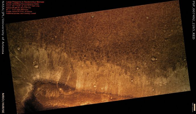 Polygons in Deuteronilus Mensae (Enhanced Absolute Natural Colors; credits for the additional process. and color.: Dr Paolo C. Fienga - Lunexit Team)
This image reveals hexagonal and polygonal patterns formed by networks of soil troughs on the floor of a valley in the Deuteronilus Mensae Region, located on the Northern edge of Arabia Terra and borders the Martian Southern Highlands and Northern Lowlands.
The polygonal patterns indicate that the surface has undergone stress, potentially caused by subsidence (sinking), desiccation (drying out), or thermal contraction. These polygon features are similar to permafrost thermal-contraction polygons that form in Polar and High Alpine Regions on Earth by seasonal-to-annual contraction of the subsoil. On Earth, such polygon features are indicative of the presence of ground ice and are commonly referred to as “patterned ground”. The patterns are the result of thermal contraction in ice-cemented soil or permafrost that forms a honeycomb network of small fractures below the surface. 

The network of fractures is eventually manifested as shallow troughs at the surface, forming the hexagonal and polygonal patterns visible in this image.

The polygons in this scene average approx. 100 meters (110 yards) in size and appear to be higher in elevation in the center than in the surrounding troughs. Boulders are accumulated in the center of the polygons and dunes are visible in several of the troughs. 

The landforms we observe here most likely indicate that ice-rich permafrost is present or has been present in the past.
Parole chiave: Mars from orbit - Polygons - Deuteronilus Mensae Region