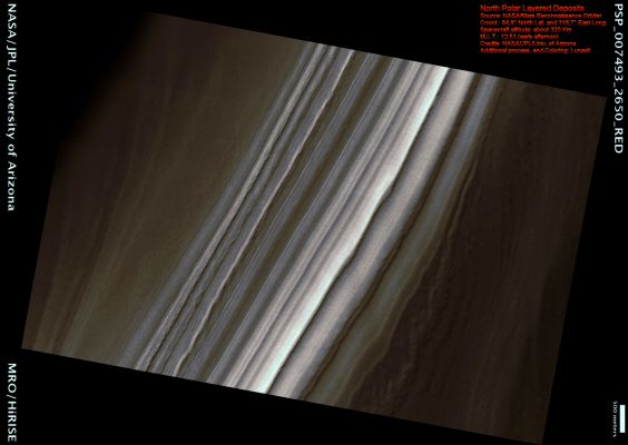 North Polar Layered Deposits covered by Seasonal Frost (MULTISPECTRUM; credits: Lunexit)
This image shows an exposure of the North Polar Layered Deposits (NPLD). The layering visible here might have been formed by recent climate variations on Mars, similar to ice ages on Earth.
While the Polar Layered Deposits are mostly water ice, exposures such as this are typically covered by a layer of reddish dust, protecting the underlying ice from evaporation during the Summer. This dusty layer hides the internal composition of the Polar Layered Deposits from view, but variations in the slopes of the surfaces of the layers are still visible.
The slope of each layer is probably affected by the internal composition, so the topography of exposures like this is of interest to scientists. When this image was taken (Northern Spring), the surface was mostly covered by seasonal CO2 frost. 
This white frost layer helps to highlight the surface slopes because the visible brightness variations are mainly caused by topographic variations. Therefore, this image will be useful for photoclinometric, or "shape from shading" analyses that can yield topographic maps limited only by the resolution of the image.

Parole chiave: Mars from orbit - North Polar Layered Deposits