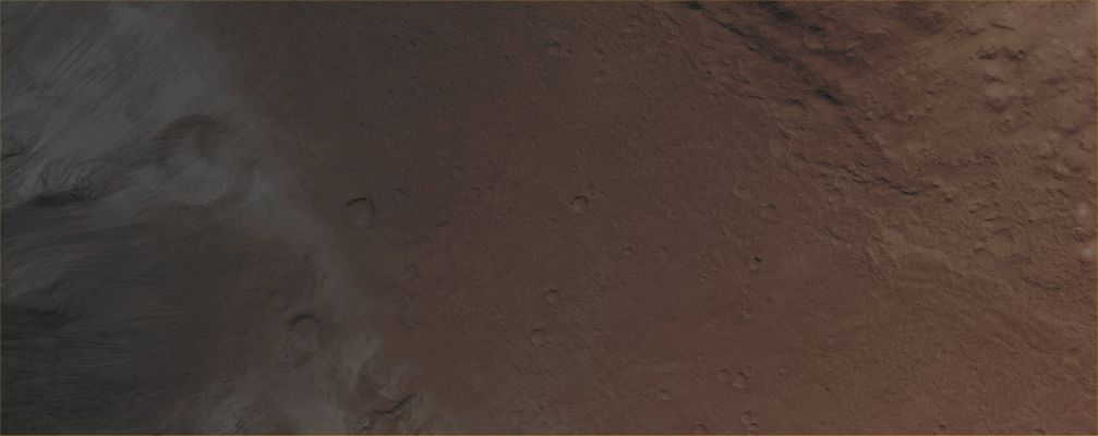 Features of Shalbatana Vallis (EDM n.1 - Absolute Natural Colors; credits for the additional process. and color.: Dr Paolo C. Fienga - Lunexit Team)
This image covers an area where the Southern Branch of Shalbatana Vallis opens into Chryse Planitia, showing a variety of boulders that have moved down slope leaving tracks on the surface. 
These boulders may have been thrown out from low-energy secondary craters, or simply eroded out of the above rocky cliff.  
 

Parole chiave: Mars from orbit - Channels - Shalbatana Vallis