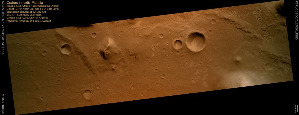Craters in Isidis Planitia (MULTISPECTRUM; credits: Lunexit)
This image shows a young impact crater in the Northern part of Isidis Planitia. The crater is fresh enough to preserve some fine textures that are eroded around other craters.

The ejecta blanket of material thrown out of the crater is distinctly dark and rough, with many small boulders and rugged texture. To the South of the crater there is a wedge-shaped area with little ejected material. This may indicate that the impactor which formed this crater came from the south, since at moderate impact angles ejecta is preferentially thrown in the direction of motion of the impactor. 

Eventually, a combination of erosion and mantling by dust will smooth and obscure the ejecta and cover over the crater, turning it into a shallow depression like the others in this image. Reworking of the crater is already beginning, as shown by the network of fine ridges (wind-blown ripples) on the crater floor.
Parole chiave: mars from orbit - Craters - Isidis Planitia