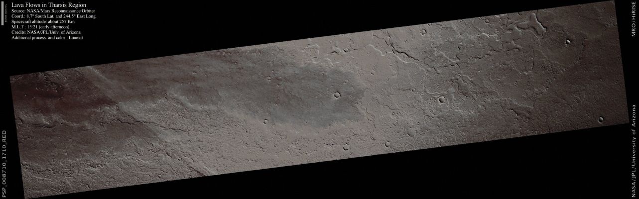 Lava Flows in Tharsis Region (Enhanced Absolute Natural Colors; credits for the additional process. and color.: Dr Paolo C. Fienga - Lunexit Team)
This image shows a relatively dark Lava Flow on the Tharsis Volcanic Plains, East of Arsia Mons.

The entire Region is composed of a thick stack of volcanic flows. The Lava Flow in the Northern part of the image (Sx) is distinctly darker than its surroundings, which are buried under a layer of dust. 
Most of the image has a fluffy, blurry texture. This is the mantle of dust or volcanic ash that commonly coats Volcanic Regions on Mars. The Dark Flow is buried by this material along its South-Eastern boundary; it appears that the mantle is being stripped off of the flow surface. Perhaps this flow is somewhat smooth at a fine scale and traps relatively little dust. 

This flow is probably young. The Western Edge of the "Dark Region" does appear to be the edge of the Lava flow, indicating that this flow is relatively high-standing. This could make it more exposed to the wind and allow the mantle to be stripped. 
Parole chiave: Mars from orbit - Volcanic Features - Lava Flows