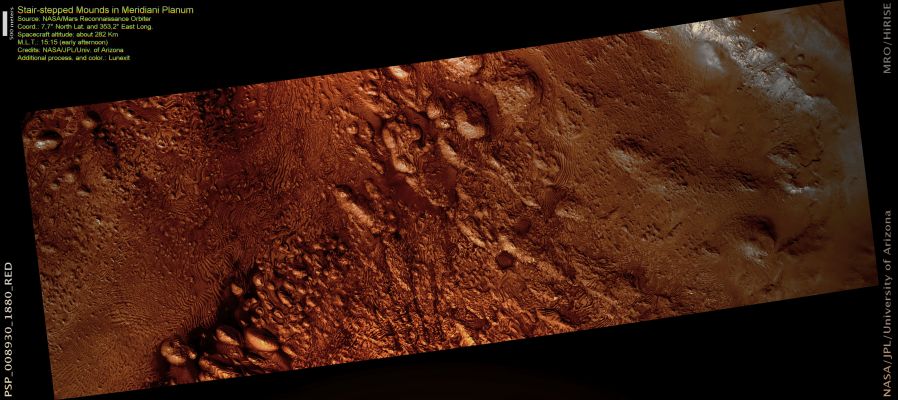 Stair-Stepped Mounds in Meridiani Planum (natural, but enhanced, colors; credits: Lunexit)
This image shows layered sedimentary rocks that fill an impact crater in the Meridiani Planum Region of Mars. 

These layered rocks may have formed through the accumulation of sediment (sand and dust) that were transported into this crater by blowing wind or flowing water. These sediments formed an extensive deposit that once covered the floor of the surrounding impact crater. 
This crater is so large that the HiRISE image is entirely within it, and the crater rim is not visible. These sedimentary rocks were then eroded, likely by the wind. The original sand and dust were deposited in distinct layers within the crater; these layers now give the mounds their distinctive stair-stepped appearance, and are all that remain from this once extensive deposit.
Parole chiave: Mars from orbit - Meridiani Planum Region