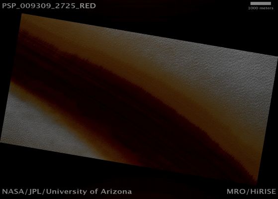 High-Latitude Exposure of North Polar Layered Deposits (possible True Colors; credits: Lunar Explorer Italia)
Mars Local Time: 19:52 (evening)
Coord. (centered): 87,5° North Lat. and 327,2° East Long.
Spacecraft altitude: 317,6 Km (such as about 198,5 miles) 
Original image scale range: 31,8 cm/pixel (with 1 x 1 binning) so objects ~95 cm across are resolved 
Map projected scale: 25 cm/pixel 
Map projection: EQUIRECTANGULAR 
Emission Angle: 5,2° 
Phase Angle: 60,3°
Solar Incidence Angle: 64° (meaning that the Sun is about 26° above the Local Horizon)
Solar Longitude: 101,9° (Northern Summer)
Credits: NASA/JPL/University of Arizona
Additional process. and coloring: Lunar Explorer Italia
Parole chiave: Mars from orbit - North Polar Features - NPLD