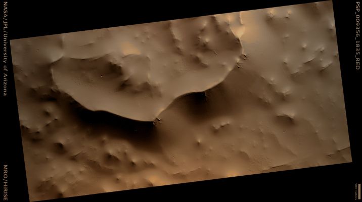 Ridged Margin of Elevated Plateau North/West of Pavonis Mons (possible True Colors; credits: Lunar Explorer Italia)
Snaking across this observation is a ridged margin that appears as though it separates two parts of a canvas.
On closer examination (see the edm), it almost looks as though there is a relatively smooth landscape on the left, and pockmarked terrain on the right.
The ridge itself is revealed in incredible detail with what appear to be "gulley-esque" grooves running its length.
Pavonis Mons is part of what is called Tharsis Montes, being the middle of three volcanoes in this Region. The name "Pavonis Mons" itself is Latin for "Mount of the Peacock".

Mars Local Time: 15:25 (early afternoon)
Coord. (centered): 3,6° North Lat. and 243,8° East Long.
Spacecraft altitude: 265,3 Km (such as about 165,8 miles) 
Original image scale range: 26,5 cm/pixel (with 1 x 1 binning) so objects ~80 cm across are resolved 
Map projected scale: 25 cm/pixel 
Map projection: EQUIRECTANGULAR 
Emission Angle: 1,3° 
Phase Angle: 54,5°
Solar Incidence Angle: 54° (meaning that the Sun is about 36° above the Local Horizon)
Solar Longitude: 103,5° (Northern Summer)
Credits: NASA/JPL/University of Arizona
Additional process. and coloring: Lunar Explorer Italia
Parole chiave: Mars from orbit - Volcanic Regions - Pavonis Mons' Region