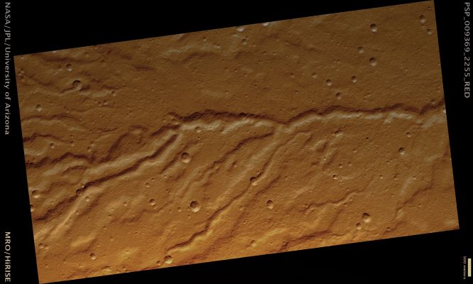 Erosion on the Flank of Alba Patera (natural colors; credits: Lunar Explorer Italia)
Mars Local Time: 15:15 (early afternoon)
Coord. (centered): 45,0° North Lat. and 243,2° East Long.
Spacecraft altitude: 295,0 Km (such as about 184,4 miles) 
Original image scale range: 29,5 cm/pixel (with 1 x 1 binning) so objects ~89 cm across are resolved 
Map projected scale: 25 cm/pixel 
Map projection: EQUIRECTANGULAR 
Emission Angle: 0,4° 
Phase Angle: 44,3°
Solar Incidence Angle: 44° (meaning that the Sun is about 46° above the Local Horizon)
Solar Longitude: 104,0° (Northern Summer)
Credits: NASA/JPL/University of Arizona
Additional process. and coloring: Lunar Explorer Italia
Parole chiave: Mars from orbit - Volcanic Features - Alba Patera