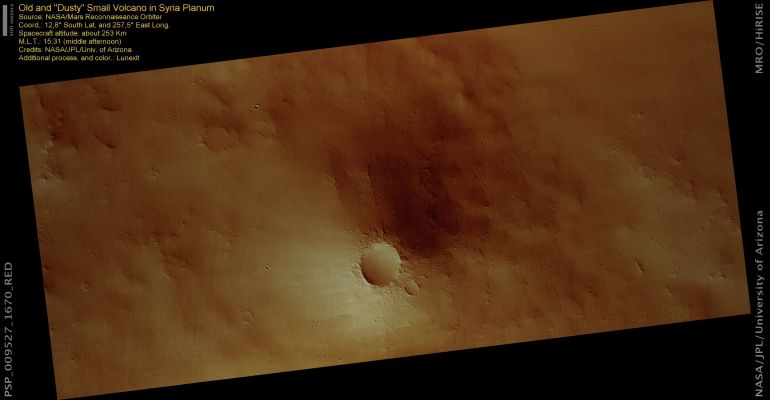 Old and "Dusty" Volcano in Syria Planum (natural colors; credits: Lunexit)
This image shows an old volcano in Syria PlanumRegion, near the edge of the Tharsis volcanic rise. This is a Region where extensive volcanism has occurred; in many places, the upper walls of Valles Marineris have cut through lava flows. 
The basic shape of the old volcano is visible here, but the entire region has been coated by dust. 
This makes it difficult to learn more about the volcanic processes that have occurred at this site. However, the mantle is interesting by itself. It has probably settled out of the atmosphere, either as dust or possibly volcanic ash, since it seems to coat the entire region uniformly. (Mars has frequent, massive Dust Storms which could create large deposits over time.) This mantle has a regular, scalloped texture that is visible at several scales.

The texture is not well understood; it is common in volcanic terrains, but also occurs on some other rock outcrops. 
HiRISE scientists are studying images like this one to determine how it forms.
Parole chiave: Mars from orbit - Syria Planum Region