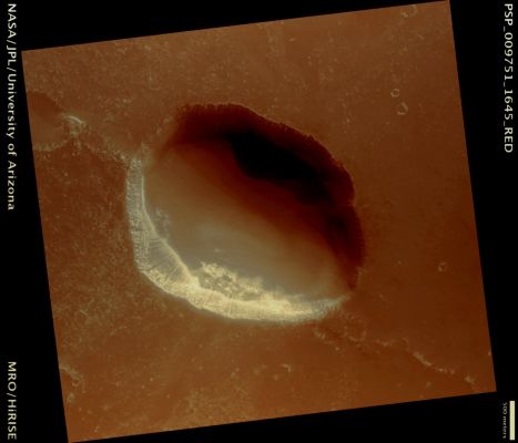 Pit in Southeastern Syria Planum (possible True Colors; credits: Lunar Explorer Italia)
Mars Local Time: 15:32 (middle afternoon)
Coord. (centered): 15,4° North Lat. and 261,7° East Long.
Spacecraft altitude: 251 Km (such as about 156,9 miles) 
Original image scale range: 25,1 cm/pixel (with 1 x 1 binning) so objects ~75 cm across are resolved 
Map projected scale: 25 cm/pixel 
Map projection: EQUIRECTANGULAR 
Emission Angle: 5° 
Phase Angle: 68°
Solar Incidence Angle: 64° (meaning that the Sun is about 26° above the Local Horizon)
Solar Longitude: 117,6° (Northern Summer)
Credits: NASA/JPL/University of Arizona
Additional process. and coloring: Lunar Explorer Italia
Parole chiave: Mars from orbit - Collapse Features - Pit