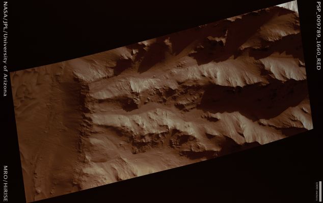 Coprates' Wall (possible True Colors; credits: Lunar Explorer Italia)
Mars Local Time: 15:42 (middle afternoon)
Coord. (centered): 14,1° South Lat. and 306,6° East Long.
Spacecraft altitude: 289,5 Km (such as about 180,9 miles) 
Original image scale range: 29 cm/pixel (with 1 x 1 binning) so objects ~87 cm across are resolved 
Map projected scale: 25 cm/pixel 
Map projection: EQUIRECTANGULAR 
Emission Angle: 26,4° 
Phase Angle: 46,9°
Solar Incidence Angle: 65° (meaning that the Sun is about 25° above the Local Horizon)
Solar Longitude: 118,9° (Northern Summer)
Credits: NASA/JPL/University of Arizona
Additional process. and coloring: Lunar Explorer Italia
Parole chiave: Mars from orbit - Coprates Chasma