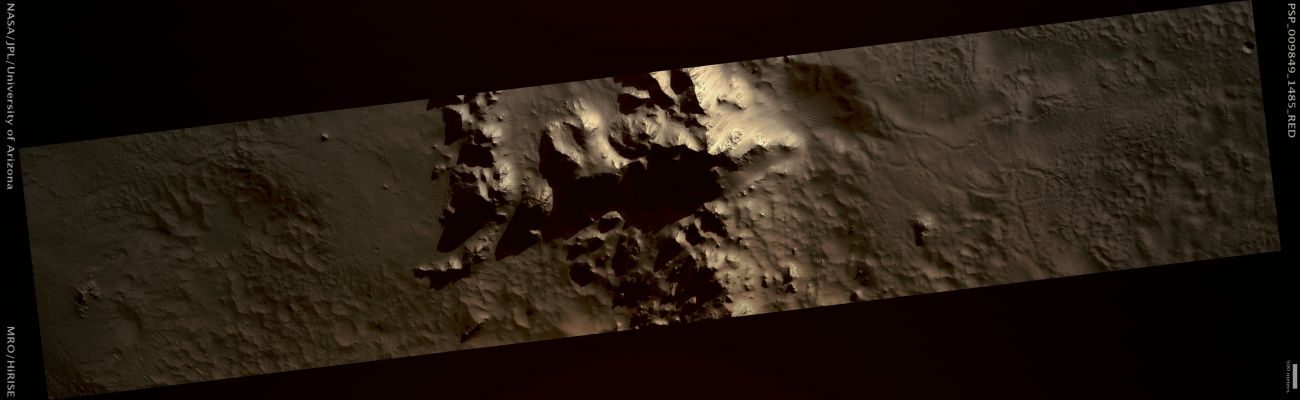 Central Uplift and Impact Melt in Unnammed Crater in Hesperia Region (possible True Colors; credits: Lunar Explorer Italia)
Mars Local Time: 15:38 (middle afternoon)
Coord. (centered): 31,3° South Lat. and 108,7° East Long.
Spacecraft altitude: 253,2 Km (such as about 158,3 miles) 
Original image scale range: 50,7 cm/pixel (with 1 x 1 binning) so objects ~1,52 mt across are resolved 
Map projected scale: 50 cm/pixel 
Map projection: EQUIRECTANGULAR 
Emission Angle: 0,4° 
Phase Angle: 74,6°
Solar Incidence Angle: 74° (meaning that the Sun is about 16° above the Local Horizon)
Solar Longitude: 121,1° (Northern Summer)
Credits: NASA/JPL/University of Arizona
Additional process. and coloring: Lunar Explorer Italia
Parole chiave: Mars from orbit - Craters - Unnamed Crater in Hesperia Region