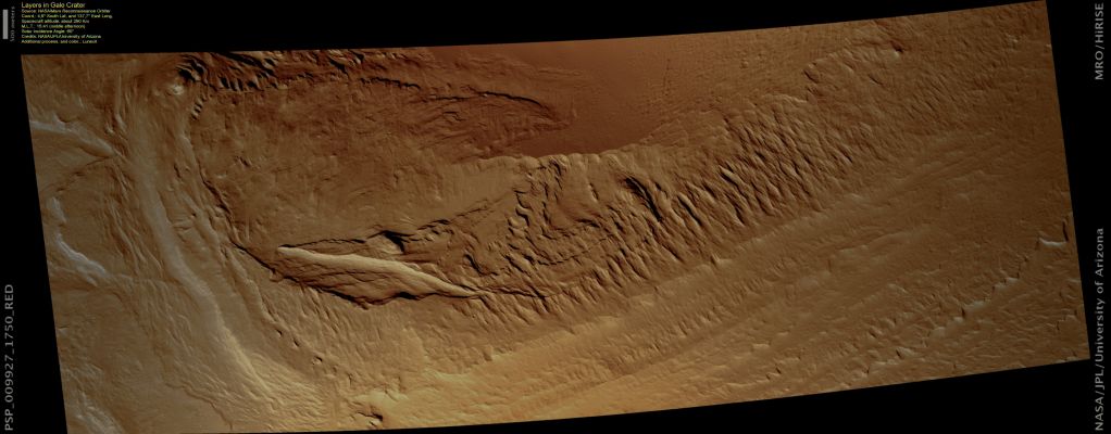 Exposed Layers in Gale Crater (Enhanced Natural Colors; credits: Lunexit)
Gale Crater contains a massive central mound of layered material that has an average vertical thickness of almost 4 Km (about 2,4 miles), making it more than twice as thick as the layers exposed along the Grand Canyon on Earth. 

Gale Crater is approximately 152 Km in diameter.
Parole chiave: Mars from orbit - Craters - Gale Crater