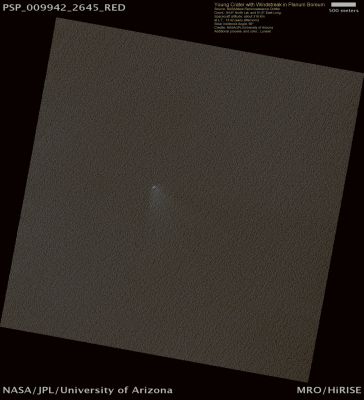 Small Crater on Planum Boreum (ctx frame - natural colors; credits: Lunexit)
Impact craters on the surface of Planum Boreum, popularly known as the North Polar Cap, are rare. This dearth of craters has lead scientists to suggest that these deposits may be geologically young (a few million years old), not having had much time to accumulate impact craters throughout their lifetime. 

It is also possible that impacts into ice do not retain their shape indefinitely, but instead that the ice relaxes (similar to glass in an old window), and the crater begins to disappear.
Parole chiave: Mars from orbit - North Polar Regions - Planum Boreum