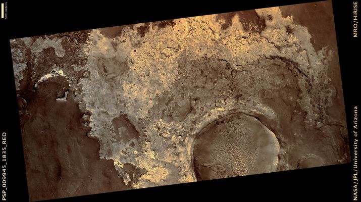 Exhumed Impact Crater in Equatorial Layered Deposits (possible True Colors; credits: Lunar Explorer Italia)
Mars Local Time: 15:30 (middle afternoon)
Coord. (centered): 3,4° North Lat. and 2,9° East Long.
Spacecraft altitude: 273,7 Km (such as about 171,1 miles) 
Original image scale range: 27,4 cm/pixel (with 1 x 1 binning) so objects ~82 cm across are resolved 
Map projected scale: 25 cm/pixel 
Map projection: EQUIRECTANGULAR 
Emission Angle: 6,2° 
Phase Angle: 59,3°
Solar Incidence Angle: 54° (meaning that the Sun is about 36° above the Local Horizon)
Solar Longitude: 124,7° (Northern Summer)
Credits: NASA/JPL/University of Arizona
Additional process. and coloring: Lunar Explorer Italia
Parole chiave: Mars from orbit - Craters - Unnamed Exhumed Crater