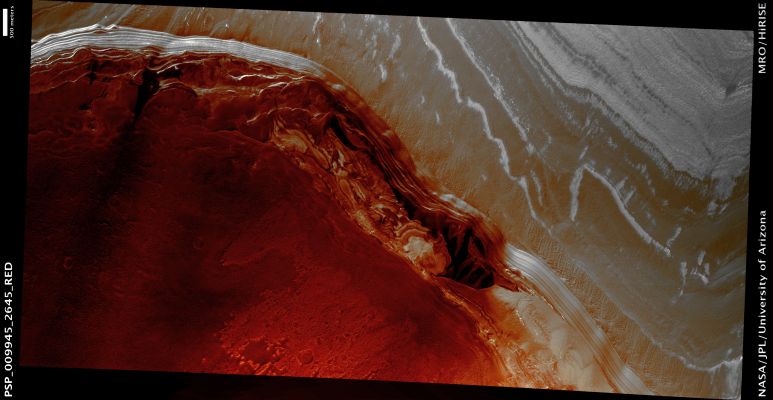 Exposure of North Polar Basal Unit (possible True - but enhanced - Colors; credits: Lunar Explorer Italia)
Mars Local Time: 14:37 (early afternoon)
Coord. (centered): 84,4° North Lat. and 343,5° East Long.
Spacecraft altitude: 330,4 Km (such as about 206,5 miles) 
Original image scale range: 33,1 cm/pixel (with 1 x 1 binning) so objects ~99 cm across are resolved 
Map projected scale: 25 cm/pixel 
Map projection: EQUIRECTANGULAR 
Emission Angle: 14,2° 
Phase Angle: 53,9°
Solar Incidence Angle: 65° (meaning that the Sun is about 25° above the Local Horizon)
Solar Longitude: 124,7° (Northern Summer)
Credits: NASA/JPL/University of Arizona
Additional process. and coloring: Lunar Explorer Italia
Parole chiave: Mars from orbit - North Polar Features - Dunes and Layered Deposits