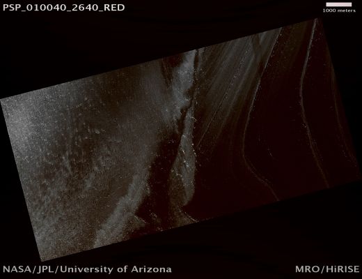 Ends of n. 2 North Polar Troughs (possible True Colors; credits: Lunar Explorer Italia)
Mars Local Time: 14:16 (early afternoon)
Coord. (centered): 83,8° North Lat. and 264,3° East Long.
Spacecraft altitude: 321,4 Km (such as about 200,9 miles) 
Original image scale range: 32,2 cm/pixel (with 1 x 1 binning) so objects ~96 cm across are resolved 
Map projected scale: 25 cm/pixel
Map projection: EQUIRECTANGULAR 
Emission Angle: 7,4° 
Phase Angle: 59,4°
Solar Incidence Angle: 65° (meaning that the Sun is about 25° above the Local Horizon)
Solar Longitude: 128,2° (Northern Summer)
Credits: NASA/JPL/University of Arizona
Additional process. and coloring: Lunar Explorer Italia
Parole chiave: Mars from orbit - North Polar Features - Troughs