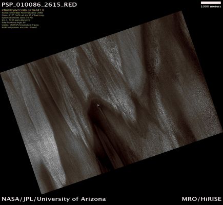 Infilled Crater on the North Polar Layered Deposits (natural colors; credits: Lunexit)
The Polar Deposits of Mars are among the most geologically active on the Planet today. This image illustrates several processes affecting the Polar Landscape both today and in the recent past.
Frost streaks cross this image from lower left to lower right and are a testament to the power of the wind to redistribute material in this Region. In the center of the image lies an impact crater about 130 meters across (425 feet). Craters on the Polar Deposits are rare because the very active surface processes remove them quickly. This particular crater is likely to have been formed less than 100.000 years ago, which is very recent in geologic terms. 
Streaks of material emanating from the crater rim have been created as the ice and dust being transported across the surface by the wind encounters that obstacle.

Although its initial depth was probably about 25 m (80 ft), the crater has been infilled with ice and dust and is now quite shallow. However, in one portion of the crater (upper area), the fill material has been removed, creating a pit adjacent to the crater wall. This pit contains a fresh deposit of ice and may be in the beginning stages of being infilled again. These cycles of infilling and erosion will eventually erase the crater from the landscape.
Scientists can examine many of these craters at different stages in their lifespan, from the very fresh to the almost erased. Using these data we can make estimates of how active this part of the Martian Surface is today. 

Of course we need to find these rare craters first! Craters this size are usually about 200 Km (approx. 125 miles) apart in this Region, with the intervening landscape being relatively featureless.
Parole chiave: Mars from orbit - Craters - Unnamed Crater in the NPLD