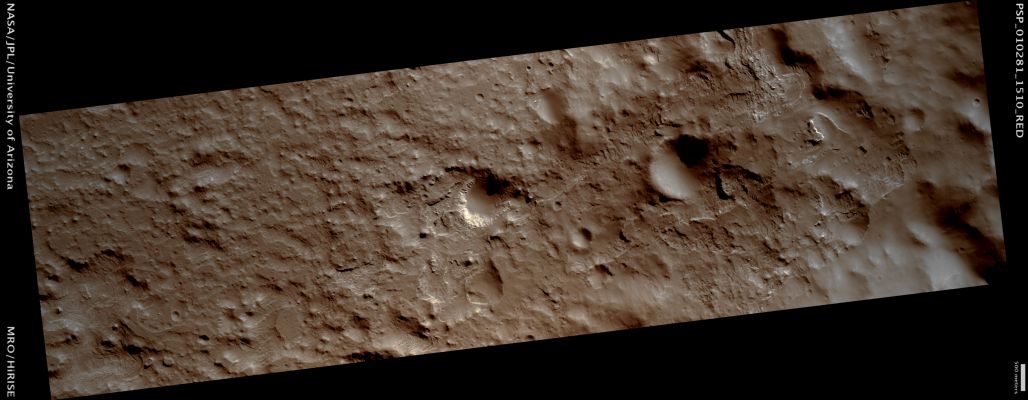Sedimentary Layers in Columbus Crater (ctx frame - possible True Colors; credits: Lunar Explorer Italia)
This image covers a portion of the North-Eastern Inner Wall of Columbus Crater, located in the Southern Hemisphere of Mars and is approx. 100 Km (about 60 miles) in diameter.

Layered sedimentary rocks are found on the Crater Walls and Floor, and may have been deposited by water or by wind. These rocks have subsequently been eroded to expose their successive layers in cross-section. 
The near-infrared spectrometer CRISM has revealed that these layers contain various hydrated minerals.

Mars Local Time: 15:42 (middle afternoon)
Coord. (centered): 28,6° South Lat. and 194,3° East Long.
Spacecraft altitude: 256,0 Km (such as about 160,0 miles) 
Original image scale range: 25,6 cm/pixel (with 1 x 1 binning) so objects ~77 cm across are resolved 
Map projected scale: 25 cm/pixel 
Map projection: EQUIRECTANGULAR 
Emission Angle: 0,5° 
Phase Angle: 70,9°
Solar Incidence Angle: 70° (meaning that the Sun is about 20° above the Local Horizon)
Solar Longitude: 137,3° (Northern Summer)
Credits: NASA/JPL/University of Arizona
Additional process. and coloring: Lunar Explorer Italia
Parole chiave: Mars from orbit - Craters - Columbus Crater