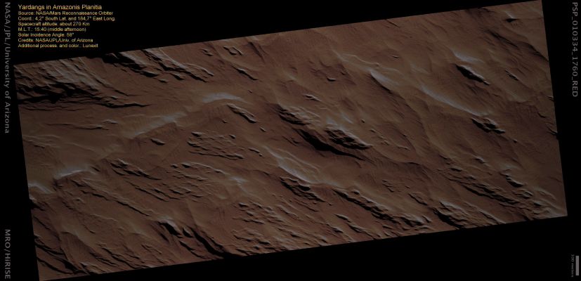 Yardangs in Southern Amazonis Planitia (natural colors; credits: Lunexit)
This image shows Yardangs, or Ridges formed from wind abrasion, in the Southern Amazonis Planitia, which is located between the Tharsis and Elysium Volcanic Provinces on Mars. 

Yardangs typically form in dry, desert environments with strong prevailing winds that are unidirectional and carry an abrasive sediment load. Abrasive winds erode the surface into parallel elongate landforms, or ridges, that are often three or more times longer than they are wide. When viewed from above, these landforms resemble the hull of a boat. Yardangs typically form in easily-eroded material, most likely sedimentary rock or volcanic ash deposits that contain some amount of sand. Sometime after the formation of these landforms, they were covered by a relatively thin, uniform coating of dust giving the area a monotone appearance. Dark slope streaks, interpreted as forming by avalanching of the dry dust, are visible on several of the slopes.

Yardangs are found on both Earth and Mars and are common on Mars in the Regions West and South-West of Olympus Mons, such as the area in this image in the southern Amazonis Planitia.
Parole chiave: Mars from orbit - Yardangs - Amazonis Planitia