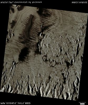 Sample of Olympus Mons West Flank (Natural Colors; credits: Lunar Explorer Italia)
Mars Local Time: 15:38 (middle afternoon)
Coord. (centered): 17,3° North Lat. and 217,9° East Long.
Spacecraft altitude: 281,5 Km (such as about 175,9 miles) 
Original image scale range: 28,2 cm/pixel (with 1 x 1 binning) so objects ~ 84 cm across are resolved 
Map projected scale: 25 cm/pixel
Map projection: EQUIRECTANGULAR 
Emission Angle: 7,1° 
Phase Angle: 45,3°
Solar Incidence Angle: 52° (meaning that the Sun is about 38° above the Local Horizon)
Solar Longitude: 142,9° (Northern Summer)
Credits: NASA/JPL/University of Arizona
Additional process. and coloring: Lunar Explorer Italia
Parole chiave: Mars from orbit - Volcanoes - Olympus Mons W.F.