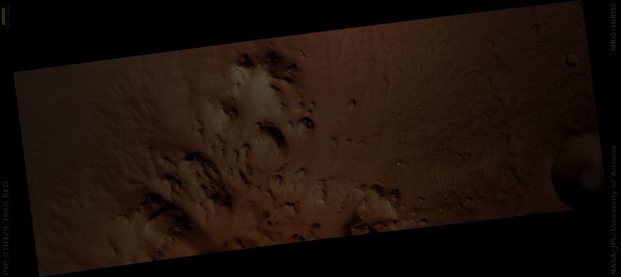Unnamed Southern Crater (Natural Colors; credits: Lunar Explorer Italia)
Mars Local Time: 15:48 (middle afternoon)
Coord. (centered): 13,8° South Lat. and 113,5° East Long.
Spacecraft altitude: 276,4 Km (such as about 172,7 miles) 
Original image scale range: 27,6 cm/pixel (with 1 x 1 binning) so objects ~ 83 cm across are resolved 
Map projected scale: 25 cm/pixel
Map projection: EQUIRECTANGULAR 
Emission Angle: 20,7° 
Phase Angle: 46,6°
Solar Incidence Angle: 63° (meaning that the Sun is about 27° above the Local Horizon)
Solar Longitude: 143,0° (Northern Summer)
Credits: NASA/JPL/University of Arizona
Additional process. and coloring: Lunar Explorer Italia
Parole chiave: Mars from orbit - Craters - Unnamed Crater