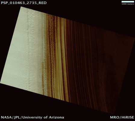 North Polar Layers (Natural Colors; credits: Lunar Explorer Italia)
Mars Local Time: 07:04 (early morning)
Coord. (centered): 86,5° North Lat. and 126,1° East Long.
Spacecraft altitude: 315,9 Km (such as about 197,4 miles) 
Original image scale range: 63,2 cm/pixel (with 1 x 1 binning) so objects ~ 1,90 mt across are resolved 
Map projected scale: 50 cm/pixel
Map projection: EQUIRECTANGULAR 
Emission Angle: 0,0° 
Phase Angle: 74,7°
Solar Incidence Angle: 75° (meaning that the Sun is about 15° above the Local Horizon)
Solar Longitude: 144,4° (Northern Summer)
Credits: NASA/JPL/University of Arizona
Additional process. and coloring: Lunar Explorer Italia
Parole chiave: Mars from orbit - North Polar Features - Layers