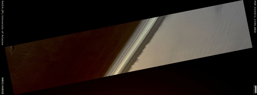 Streaks on Exposure of North Polar Layered Deposits (Natural Colors; credits: Lunar Explorer Italia)
Mars Local Time: 14:47 (early afternoon)
Coord. (centered): 78,8° North Lat. and 357,2° East Long.
Spacecraft altitude: 317,4 Km (such as about 198,4 miles) 
Original image scale range: 63,5 cm/pixel (with 1 x 1 binning) so objects ~ 1,91 mt across are resolved 
Map projected scale: 50 cm/pixel
Map projection: EQUIRECTANGULAR 
Emission Angle: 0,9° 
Phase Angle: 66,9°
Solar Incidence Angle: 68° (meaning that the Sun is about 22° above the Local Horizon)
Solar Longitude: 144,7° (Northern Summer)
Credits: NASA/JPL/University of Arizona
Additional process. and coloring: Lunar Explorer Italia
Parole chiave: Mars from orbit - North Polar Features - NPLD