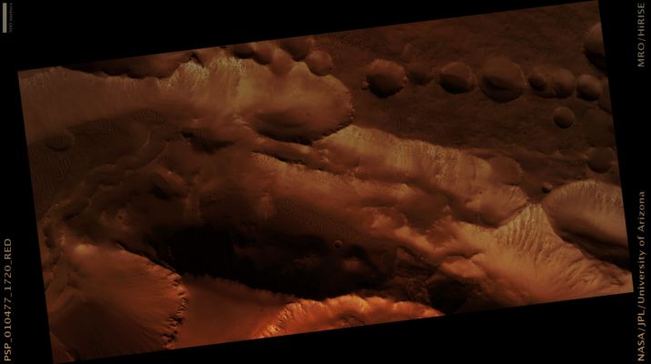Pit Chain and other Collapse Features in Arsia Chasma (Natural Colors; credits: Lunar Explorer Italia)
Mars Local Time: 15:41 (middle afternoon)
Coord. (centered): 7,8° South Lat. and 240,7° East Long.
Spacecraft altitude: 256,1 Km (such as about 153,8 miles) 
Original image scale range: 49,2 cm/pixel (with 1 x 1 binning) so objects ~ 1,48 mt across are resolved 
Map projected scale: 50 cm/pixel
Map projection: EQUIRECTANGULAR 
Emission Angle: 0,1° 
Phase Angle: 59,2°
Solar Incidence Angle: 59° (meaning that the Sun is about 31° above the Local Horizon)
Solar Longitude: 144,9° (Northern Summer)
Credits: NASA/JPL/University of Arizona
Additional process. and coloring: Lunar Explorer Italia
Parole chiave: Mars from orbit - Collapse Features - Pits - Arsia Chasma Region