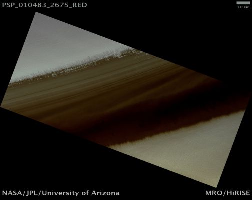 High-Latitude Exposure of North Polar Layered Deposits (Natural Colors; credits: Lunar Explorer Italia)
Mars Local Time: 14:44 (early afternoon)
Coord. (centered): 87,3° North Lat. and 55,2° East Long.
Spacecraft altitude: 340,6 Km (such as about 212,9 miles) 
Original image scale range: 68,2 cm/pixel (with 1 x 1 binning) so objects ~2,04 mt across are resolved 
Map projected scale: 50 cm/pixel
Map projection: EQUIRECTANGULAR 
Emission Angle: 23,5° 
Phase Angle: 55,2°
Solar Incidence Angle: 74° (meaning that the Sun is about 16° above the Local Horizon)
Solar Longitude: 145,1° (Northern Summer)
Credits: NASA/JPL/University of Arizona
Additional process. and coloring: Lunar Explorer Italia
Parole chiave: Mars from orbit - North Polar Features - NPLD