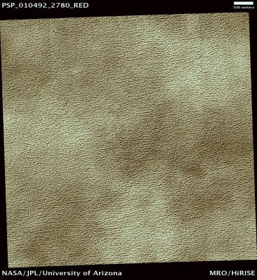 Color and Morphology of the North Polar Residual Cap (Natural Colors; credits: Lunar Explorer Italia)
Mars Local Time: 04:49 (night hours)
Coord. (centered): 82,0° North Lat. and 20,0° East Long.
Spacecraft altitude: 318,7 Km (such as about 199,2 miles) 
Original image scale range: 31,9 cm/pixel (with 1 x 1 binning) so objects ~ 96 cm across are resolved 
Map projected scale: 25 cm/pixel
Map projection: EQUIRECTANGULAR 
Emission Angle: 3,0° 
Phase Angle: 76,2°
Solar Incidence Angle: 79° (meaning that the Sun is about 11° above the Local Horizon)
Solar Longitude: 145,5° (Northern Summer)
Credits: NASA/JPL/University of Arizona
Additional process. and coloring: Lunar Explorer Italia
Parole chiave: Mars from orbit - North Polar Features - Residual Cap