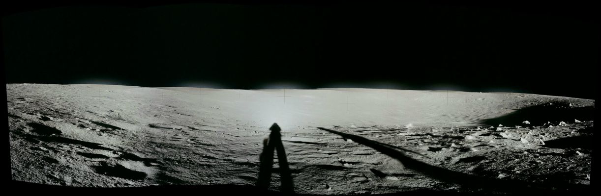From AS 12-46-6845 until 6851 (EVA-1; Middle Crescent Crater)
118:18:41 MT - Pete Conrad has moved to his left several feet and starts a clockwise, left-to-right partial pan back around to the Northeastern Rim to give a stereo view of Middle Crescent Crater. The discoloration at the center of the image is due to a dust smudge on the lens that showed up first on AS 6813.

Parole chiave: Lunar Surface - Middle Crescent Crater