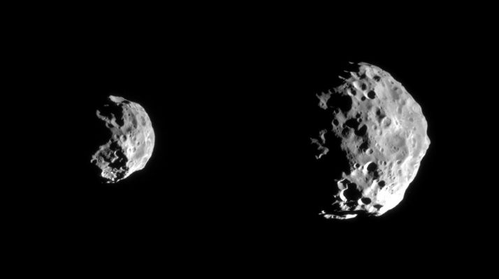 Phoebe
Caption NASA:"Early images returned from the first detailed reconnaissance of Saturn's small outer moon, Phoebe, show breathtaking details in the moon's pockmarked Surface that already have imaging scientists puzzling over the body's history. The images are only a preview of what to expect from the High Resolution images which will show details about 10 times smaller.
Phoebe has revealed itself to be a rugged, heavily cratered body, with overlapping craters of varying sizes. 
This morphology suggests an old Surface. There are apparently many craters smaller than 1 km, indicating that projectiles probably smaller than 100 meters once pummeled Phoebe. 
Whether these objects were Cometary or Asteroidal in origin, or were the debris that resulted from impacts on other bodies within the Saturn System, is hotly debated. There is also variation in surface brightness across the body. 

In the first image (at left) in which Phoebe looks somewhat like a sideways skull, the large crater near the bottom displays a complex and rugged interior. The lower right hand part of Phoebe appears to be covered by bright wispy material.

The second, Higher Resolution image further reveals the moon's battered Surface, including a crater near the right hand edge with bright rays that extend outward from its center. This suggests that dark material coats the outside. Features reminiscent of those seen on the Martian moon Phobos -- such as Linear Grooves -- are faintly visible in the upper part of this image. 

There are suggestions of Linear Ridges or Grooves and of Chains of Craters, perhaps radial to a large crater just hidden on the un-illuminated region in the upper left.

Left to right, the two views were obtained at phase, or Sun-Phoebe-Spacecraft, Angles of approximately 86°, and from distances ranging from 143.068 Km (88.845,228 miles) to 77,441 kilometers (48.090,861 miles); for reference, Cassini's closest approach to Phoebe was approximately 2068 Km (1284,228 miles). The image scale ranges from 0,86 to 0,46 Km per pixel. No enhancement of any kind has been performed on the images".
Parole chiave: Saturnian Moons - Phoebe
