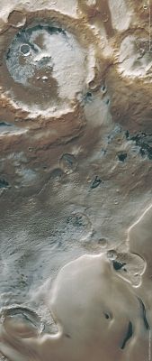 Promethei Terra (Natural Colors + MULTISPECTRUM; credits: ESA & Lunexit)
Promethei Planum, an area seasonally covered with layer of ice more than 3500 mt thick layer of ice in the Martian South Polar Region, was the subject of the High Resolution Stereo Camera’s focus on 22 September 2005 as Mars Express was in orbit above the Red Planet. 
Promethei Planum lies at approx. 76° South Lat. and 105° East Long. 
An approx. 100 Km-large and 800 mt-deep impact crater is visible in the Northern part of the image. The crater’s interior is partly covered in ice. 

In the centre of the image are structures that may have been created by basaltic lava flow from a volcano. This area is covered in ice. The dark dunes towards the bottom of the image are most likely made up of dust originating from this lava flow or volcanic ash. 
A broad sheet of ice, which is an extension of the South Polar Ice Cap is located South of the lava flow. The steep flanks clearly show white, clean ice. The thickness of the ice is between 900 and 1100 mt.
Parole chiave: Mars from orbit - Promethei Terra Region