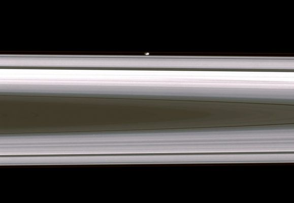 Spotting Prometheus (MULTISPECTRUM; credits: Lunexit)
Caption NASA:"The flattened, potato-like form of Prometheus glides silently within the Roche Division, between Saturn's A and F-Rings. 
Prometheus (86 Km, or about 53 miles across at its widest point) is on the side of the Rings closest to the Cassini Spacecraft in this view. The image looks toward the sunlit side of the Rings from about 1° below the Ring-Plane. 

The image was taken in visible light with the Cassini Spacecraft narrow-angle camera on May 2, 2008. The view was acquired at a distance of approx. 1,1 MKM (such as about 660.000 miles) from Prometheus. 
Image scale is roughly 6 Km (about 4 miles) per pixel".
Parole chiave: Saturn's Moons - Prometheus