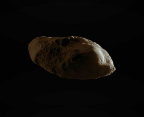 Prometheus (Possible Natural Colors; credits: Dr Paolo C. Fienga - Lunexit Team)
Caption NASA:"Appearing like eyes on a potato, craters cover the dimly lit Surface of the moon Prometheus in this HR image from the Cassini Spacecraft's early 2010 flyby.
The Jan. 27 encounter represented the closest imaging sequence yet of that moon for Cassini. 

This view looks toward the Trailing Hemisphere of Prometheus (about 86 Km, or approx. 53 miles across). North on Prometheus is up and rotated 8° to the right.
The moon is lit by Sunlight on the right and Saturnshine on the left.

The image was taken in Visible Light with the Cassini Spacecraft narrow-angle camera on Jan. 27, 2010. The view was obtained at a distance of approx. 34.000 Km (about 21.000 miles) from Prometheus and at a Sun-Prometheus-Spacecraft, or Phase, Angle of 126°. 
Image scale is roughly 200 meters (656 feet) per pixel".
Parole chiave: Saturnian Moons - Prometheus