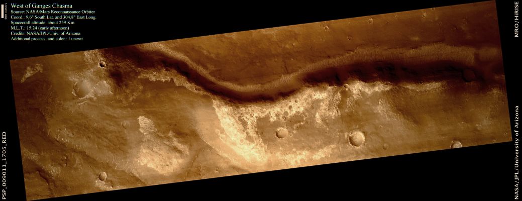 "Apparent Valley", West of Ganges Chasma (natural colors; credits: Lunexit)
This image shows an "Apparent Valley" North of a 37-Km long pit called Ophir Cavus. This valley is just West of another 155-Km long valley system called Allegheny Vallis, that also emanates from the pit.

The association of valleys with the pit suggests that water was released when the pit formed, perhaps when volcanic eruptions melted ice in the surface or subsurface. 
The HiRISE image reveals light-toned units along portions of the plains and these could be minerals deposited by the flowing water or alteration of the plains by the water that once flowed here.
Parole chiave: Mars from orbit - Valley