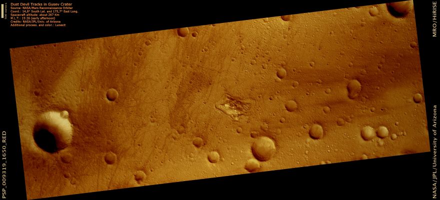 Dust Devil Tracks in Gusev Crater (Extremely Enhanced Natural Colors; credits for the additional process. and color.: Dr Paolo C. Fienga - Lunexit Team)
Gusev Crater is decorated by tracks made by Dust Devils that have been observed by the Mars Exploration Rover Spirit, Mars Orbiter Camera (MOC), and HiRISE images. 
Dust Devils are of interest because they may clean the Solar Panels that provide power to Spirit, and are partially responsible for dust transportation on the surface of Mars. 

Dust Devils are actually giant convective vortices that form as a result of atmospheric vertical instability. Solar radiation warms the surface, forcing air to rise to an atmospheric convective boundary, where it then cools. The denser, cold air parcel descends and generates a circulation that creates a suction effect. 
As the Dust Devil picks up material from the bright dust-mantled surface, it exposes the darker basaltic substrate. These scribble marks will follow the prevailing winds and tend to cluster together as the lower albedo surface heats up more quickly. 
Scientists are trying to understand the relationship between Dust Devils and craters and other topographic features that generate multiple wind directions.
Parole chiave: Mars from orbit - DD Tracks - Gusev Crater
