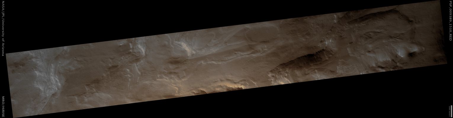 Bedrock Layers Exposed in Northern Hellas Basin (possible True Colors; credits: Lunar Explorer Italia)
Mars Local Time: 15:30 (middle afternoon)
Coord. (centered): 28,9° South Lat. and 67,0° East Long.
Spacecraft altitude: 261,7 Km (such as about 163,6 miles) 
Original image scale range: 52,4 cm/pixel (with 1 x 1 binning) so objects ~1,57 mt across are resolved 
Map projected scale: 50 cm/pixel 
Map projection: EQUIRECTANGULAR 
Emission Angle: 0,3° 
Phase Angle: 73,9°
Solar Incidence Angle: 74° (meaning that the Sun is about 16° above the Local Horizon)
Solar Longitude: 104,7° (Northern Summer)
Credits: NASA/JPL/University of Arizona
Additional process. and coloring: Lunar Explorer Italia
Parole chiave: Mars from orbit - Hellas Basin
