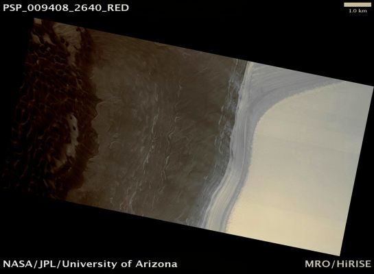 Mass Wasting on the North Polar Scarp (possible True Colors; credits: Lunar Explorer Italia)
Mars Local Time: 13:34 (early afternoon)
Coord. (centered): 84,0° North Lat. and 230,1° East Long.
Spacecraft altitude: 316,9 Km (such as about 198,0 miles) 
Original image scale range: 31,7 cm/pixel (with 1 x 1 binning) so objects ~95 cm across are resolved 
Map projected scale: 25 cm/pixel 
Map projection: EQUIRECTANGULAR 
Emission Angle: 0,8° 
Phase Angle: 61,0°
Solar Incidence Angle: 60° (meaning that the Sun is about 30° above the Local Horizon)
Solar Longitude: 105,3° (Northern Summer)
Credits: NASA/JPL/University of Arizona
Additional process. and coloring: Lunar Explorer Italia
Parole chiave: Mars from orbit - North Polar Features - Scarp