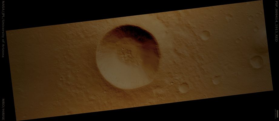 Recent Impact Crater (possible True Colors; credits: Lunar Explorer Italia)
Mars Local Time: 15:30 (middle afternoon)
Coord. (centered): 11,5° North Lat. and 100,8° East Long.
Spacecraft altitude: 289,2 Km (such as about 180,8 miles) 
Original image scale range: 28,9 cm/pixel (with 1 x 1 binning) so objects ~87 cm across are resolved 
Map projected scale: 25 cm/pixel 
Map projection: EQUIRECTANGULAR 
Emission Angle: 17,4° 
Phase Angle: 36,6°
Solar Incidence Angle: 51° (meaning that the Sun is about 39° above the Local Horizon)
Solar Longitude: 105,5° (Northern Summer)
Credits: NASA/JPL/University of Arizona
Additional process. and coloring: Lunar Explorer Italia
Parole chiave: Mars from orbit - Craters - Unnamed Impact Crater