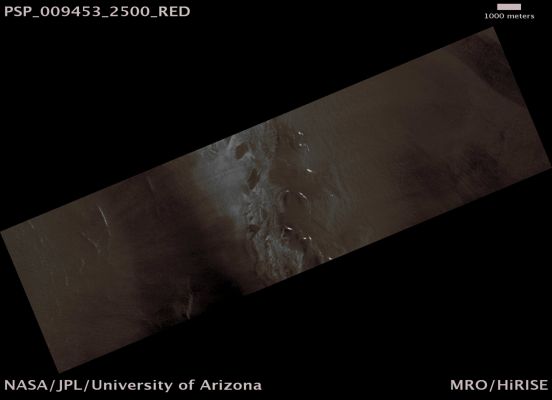 The Southern Rim of Louth Crater (possible True Colors; credits: Lunar Explorer Italia)
Mars Local Time: 14:57 (early afternoon)
Coord. (centered): 69,9° North Lat. and 103,3° East Long.
Spacecraft altitude: 313,8 Km (such as about 196,1 miles) 
Original image scale range: 62,8 cm/pixel (with 1 x 1 binning) so objects ~1,88 mt across are resolved 
Map projected scale: 50 cm/pixel 
Map projection: EQUIRECTANGULAR 
Emission Angle: 0,5° 
Phase Angle: 53,1°
Solar Incidence Angle: 53° (meaning that the Sun is about 37° above the Local Horizon)
Solar Longitude: 106,9° (Northern Summer)
Credits: NASA/JPL/University of Arizona
Additional process. and coloring: Lunar Explorer Italia
Parole chiave: Mars from orbit - Craters - Lauth Crater