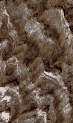 Ceti Mensa (edm - natural colors; credits: Lunexit)
This image gives us another clue to the formation of Ceti Mensa. Close-up examination shows fine banding in the layers of Ceti Mensa that is exposed by the ongoing erosion. The banding is produced by alternating bright and dark material. The thickness of the individual bands ranges from a few meters down to the resolution limit of the image, a few tens of centimeters. The bands are parallel, although they appear wavy on the irregular, eroded surface.

The banding visible in this image most closely resembles terrestrial lake deposits and similar rocks formed in aqueous, low energy depositional environments. Structures such as cross-bedding that are hallmarks of wind-deposited sediments are absent, as are cobbles and clasts that are typical of glacial sediments. If this interpretation is correct, the thickness of Ceti Mensa suggests formation in standing bodies of water that were several kilometers deep.
Parole chiave: Mars from orbit - Ceti Mensa